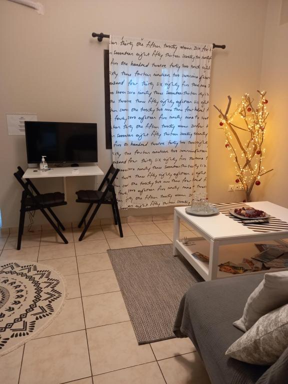 A television and/or entertainment centre at Helen's Welcoming & cozy flat