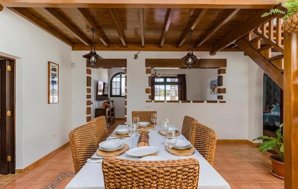A seating area at Pico Partido villa heated pool