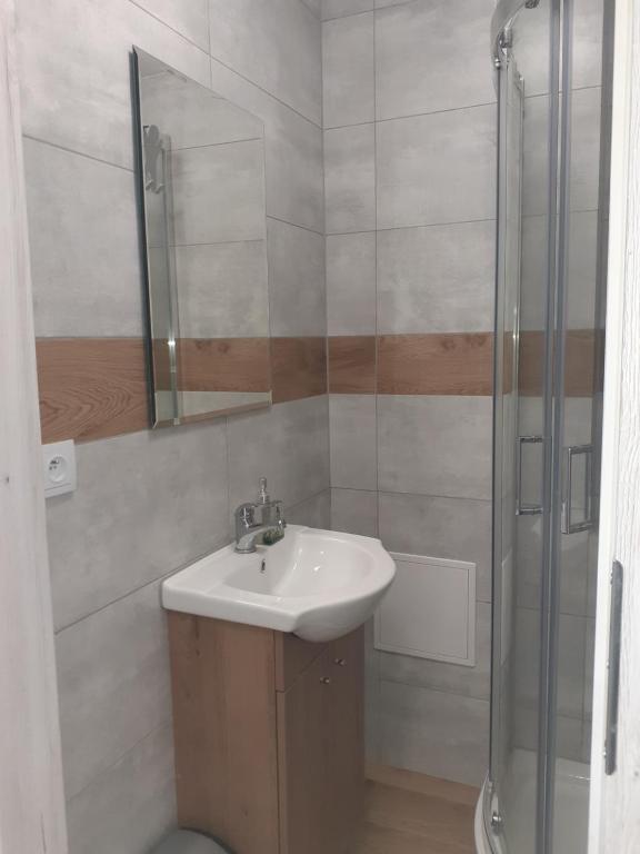 Kúpeľňa v ubytovaní APARTAMENTY CENTRUM PIŁSUDSKIEGO