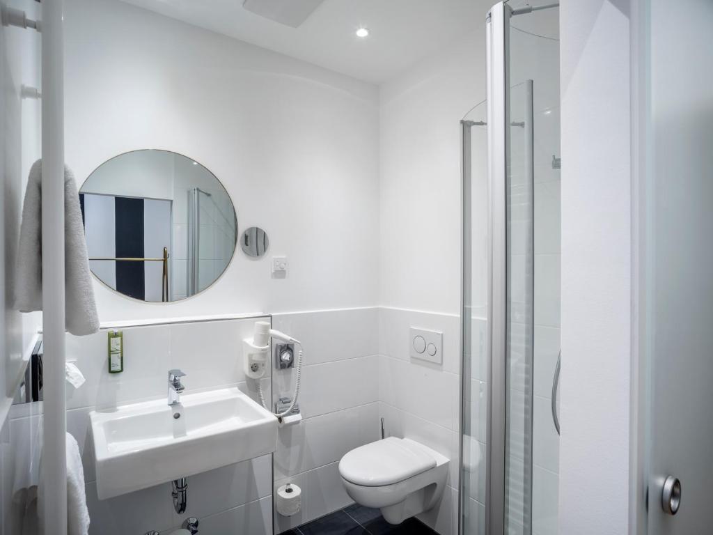 Koupelna v ubytování acor Boutique Hotel