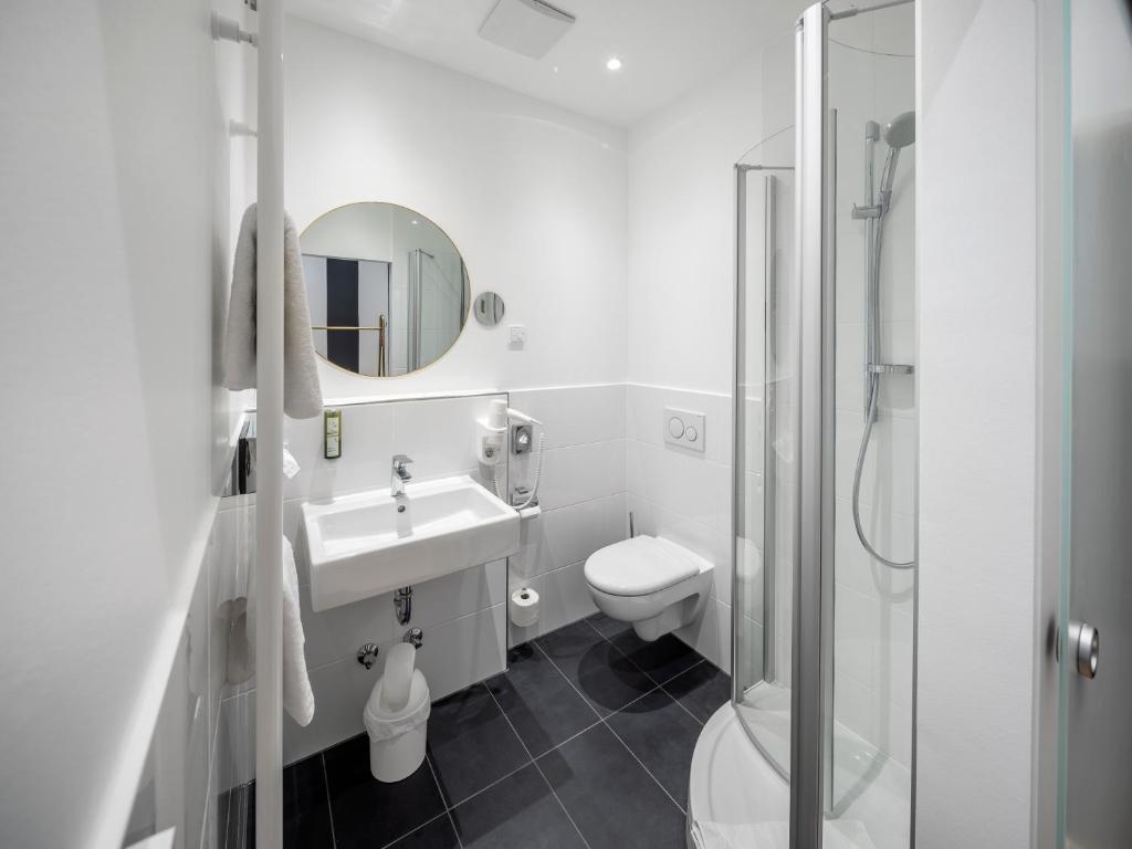 Koupelna v ubytování acor Boutique Hotel