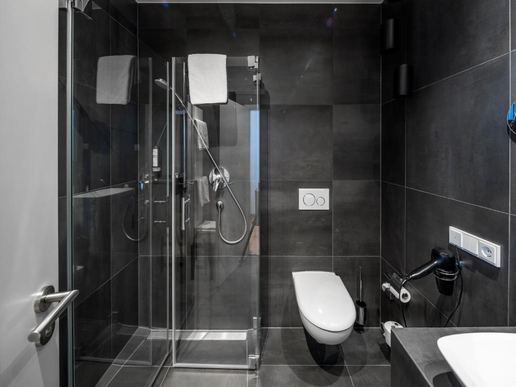 Koupelna v ubytování acor Boutique Hotel