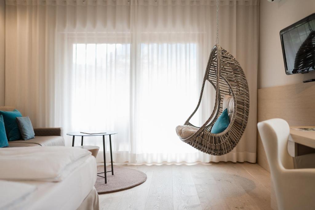 Postel nebo postele na pokoji v ubytování Hotel Wiesenhof