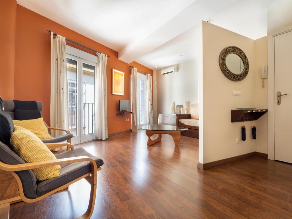 A seating area at San Felipe Sevilla Urban Apartment