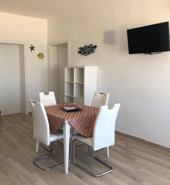 A television and/or entertainment centre at Viva Vista Mare Bilo Secondo Piano Vista