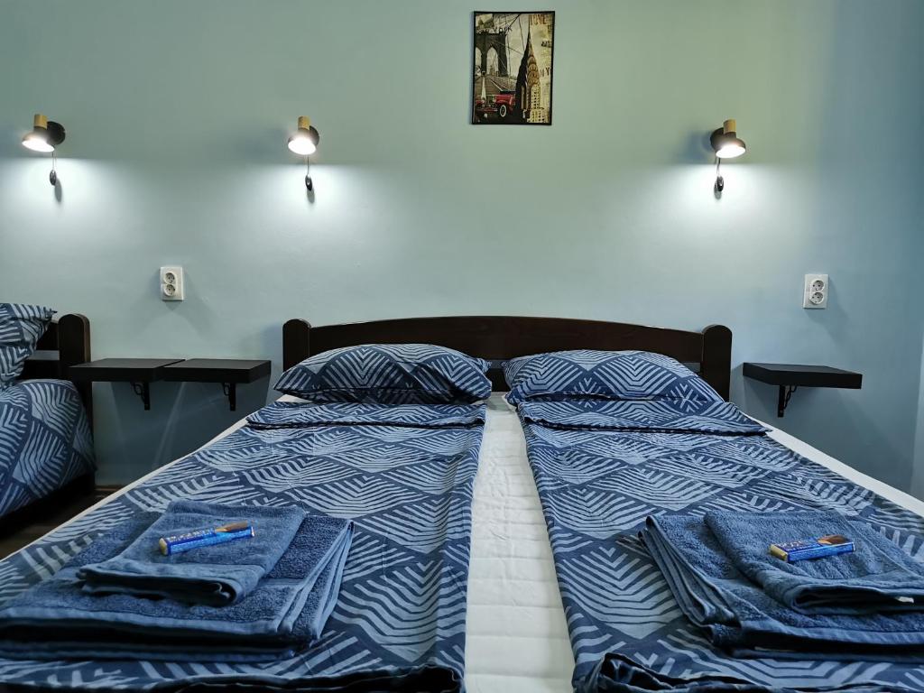 Postel nebo postele na pokoji v ubytování Apartman Centrum