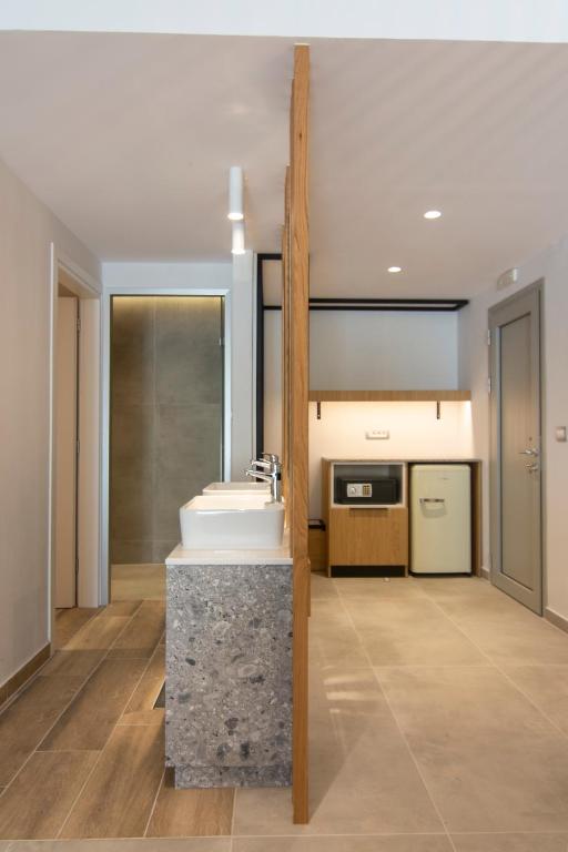 Kuchyň nebo kuchyňský kout v ubytování Alboro seaside suites