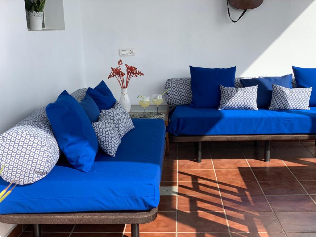 A seating area at Pico Partido villa heated pool