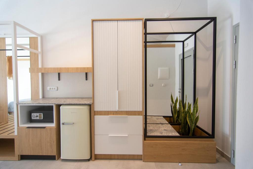 Kuchyň nebo kuchyňský kout v ubytování Alboro seaside suites