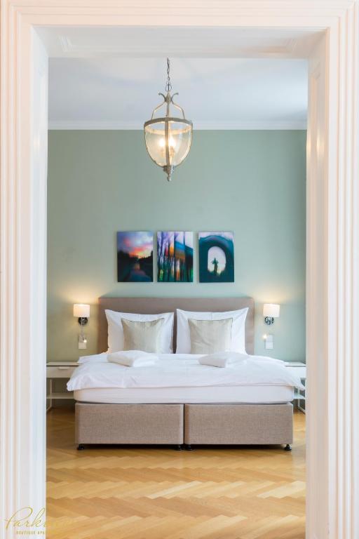 Posteľ alebo postele v izbe v ubytovaní Parkview Boutique Apartments