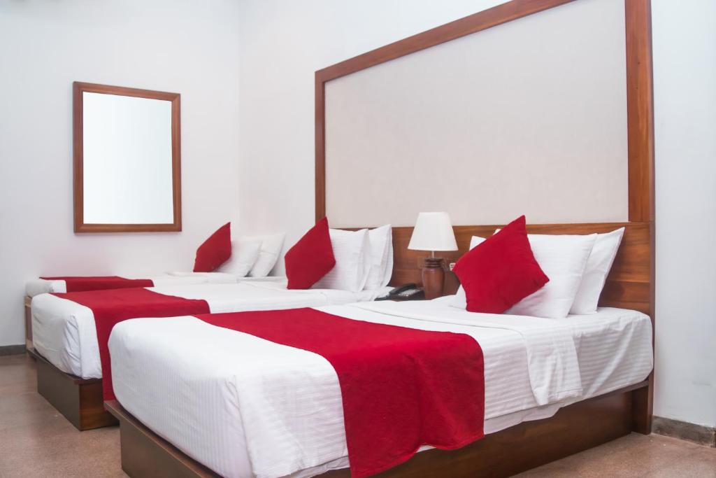 Postel nebo postele na pokoji v ubytování Tarshish Villa - Colombo
