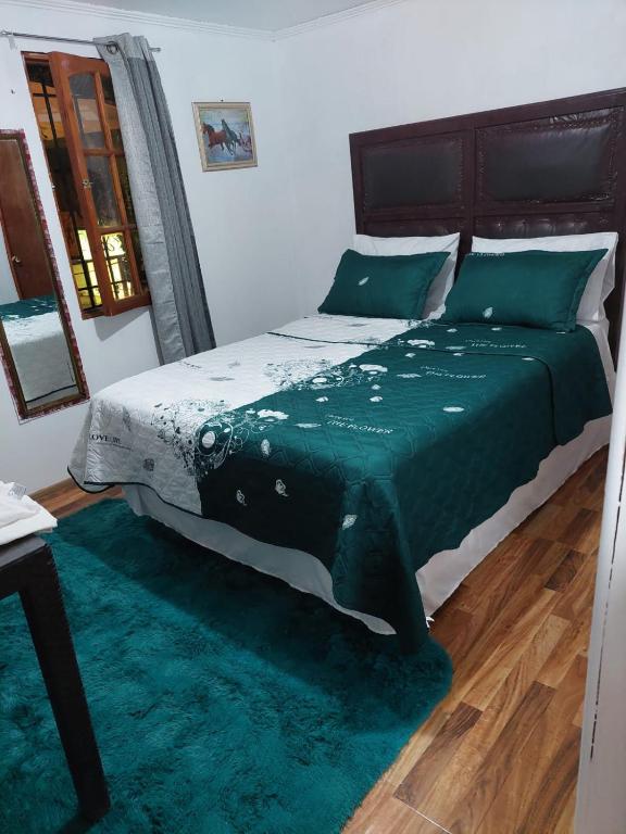 Postel nebo postele na pokoji v ubytování Jallalla