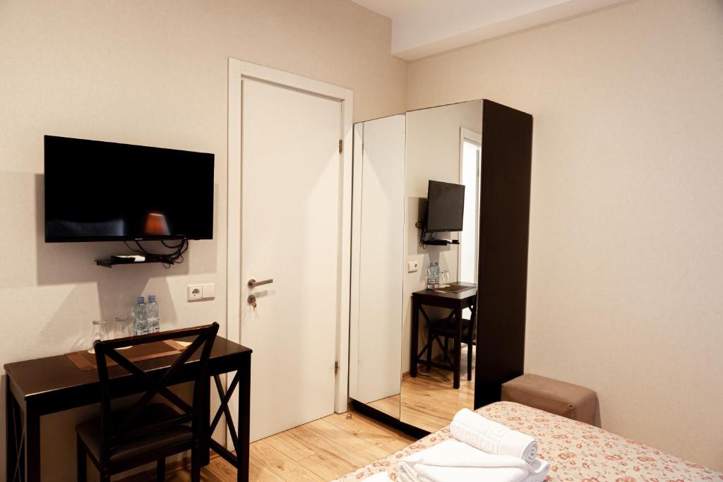 TV a/nebo společenská místnost v ubytování Hotel Winoterra
