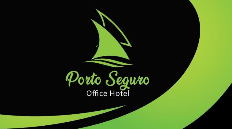 a green and black sign with a sail boat at Porto Seguro Office Hotel in Bauru