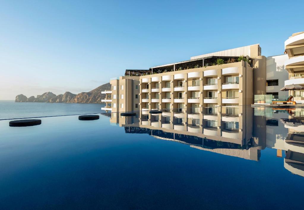 a rendering of a hotel on the water at Corazón Cabo, a Noble House Resort in Cabo San Lucas