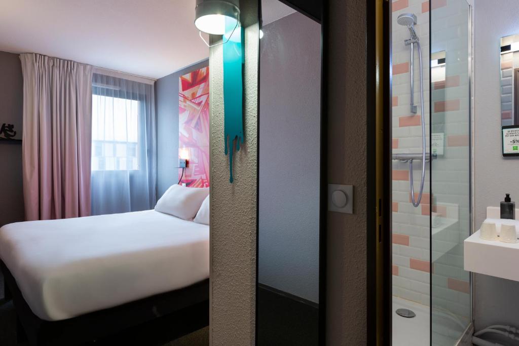 Postel nebo postele na pokoji v ubytování Ibis Styles Toulouse Centre Canal du Midi
