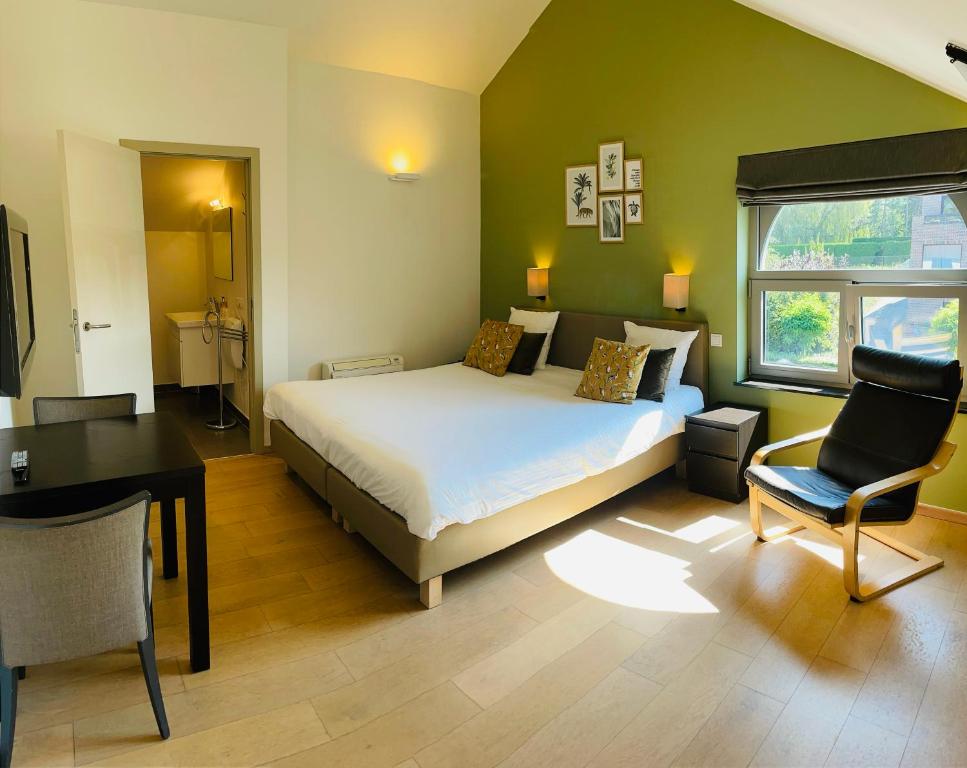 Postel nebo postele na pokoji v ubytování Hotel & Apartments Bibois Leuven