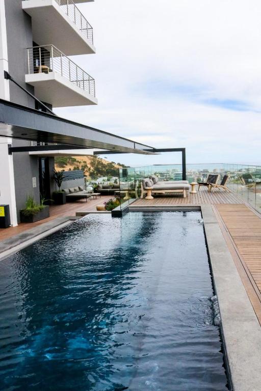 a swimming pool on the roof of a building at 2218 at 16 on Bree in Cape Town