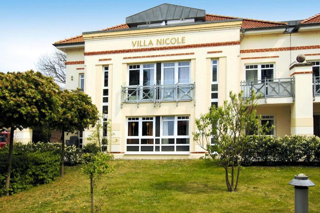 a building with the words villa moore on it at Apartment Villa Nicole, Zingst in Zingst