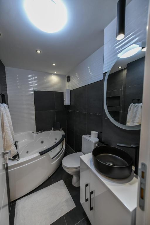 Baðherbergi á BANE APARTMANI 4.