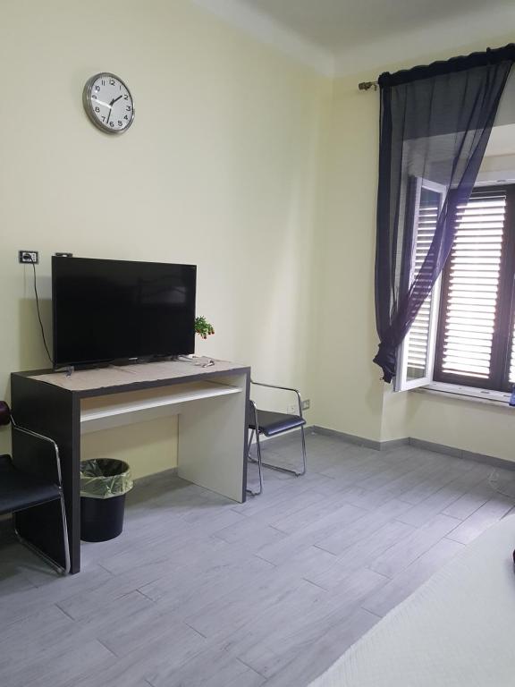 A television and/or entertainment centre at Lili & Aurora Home