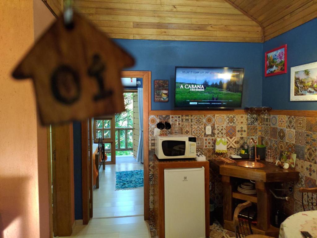 Kuchyň nebo kuchyňský kout v ubytování Cabana Drechsler Gramado