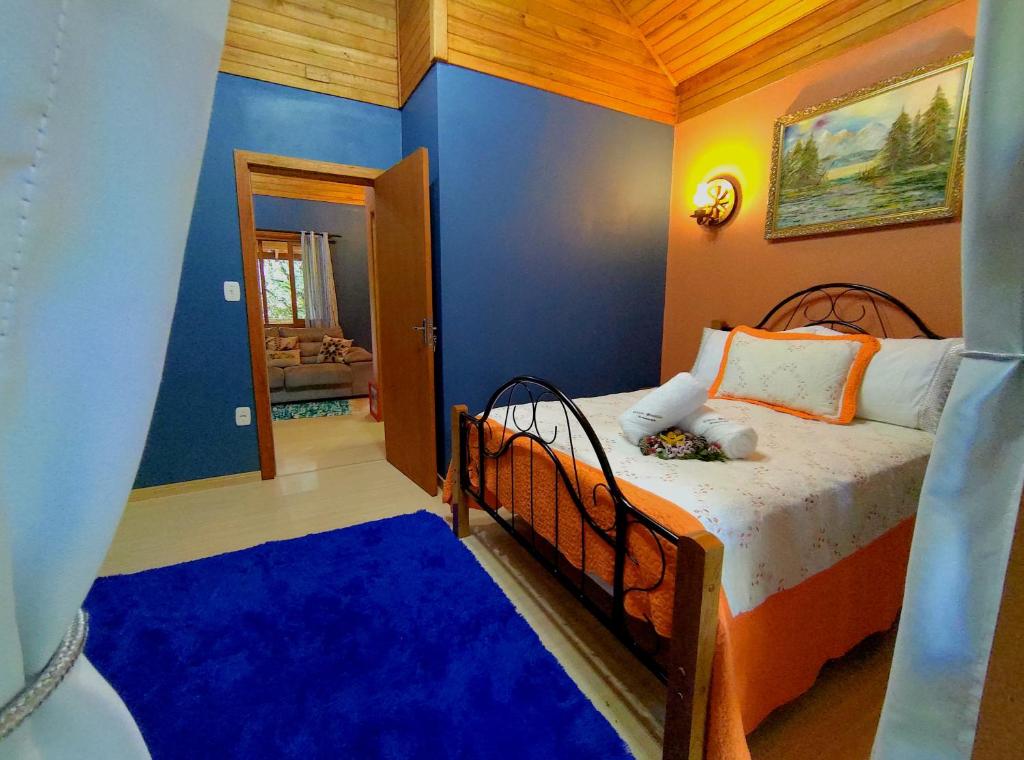 Postel nebo postele na pokoji v ubytování Cabana Drechsler Gramado