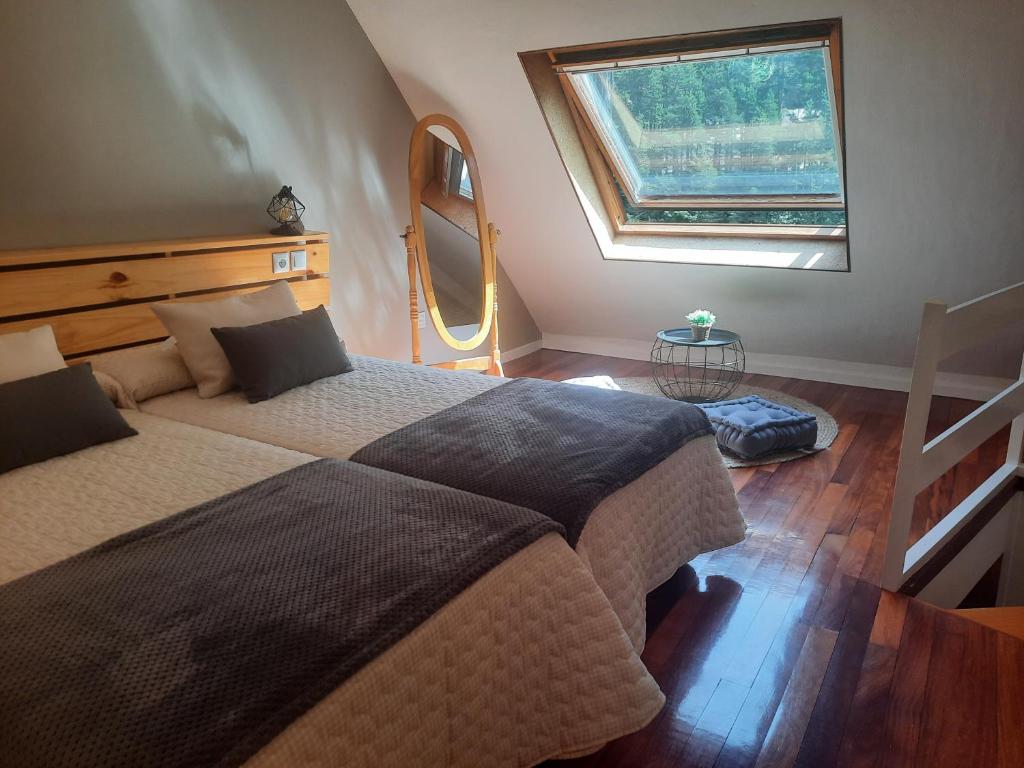 Postel nebo postele na pokoji v ubytování Acogedor y cálido apartamento con vistas a la montaña