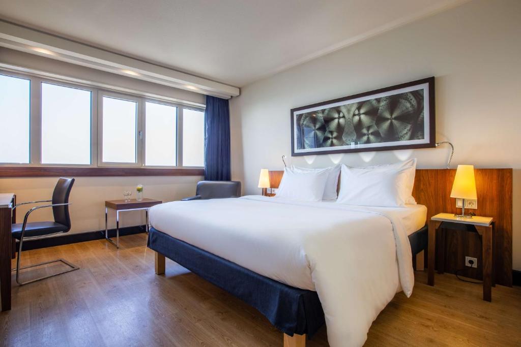 Postel nebo postele na pokoji v ubytování Radisson Blu Hotel, Hamburg