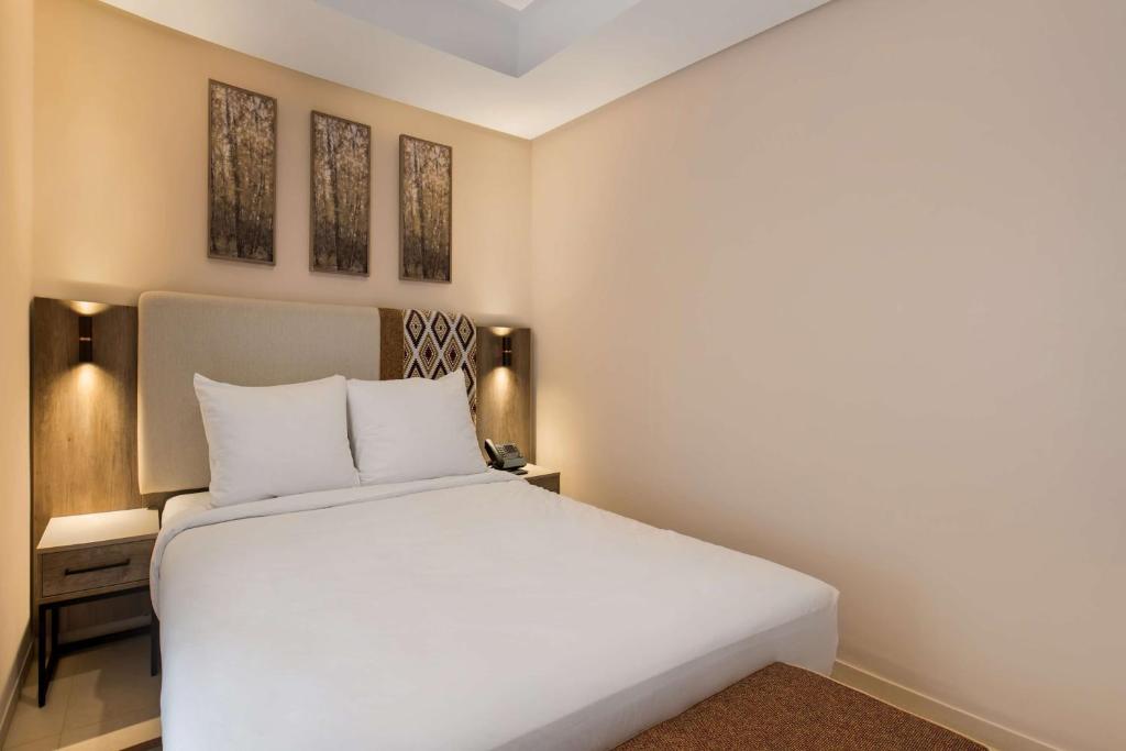 Letto o letti in una camera di Radisson Blu Residences Al Hoceima