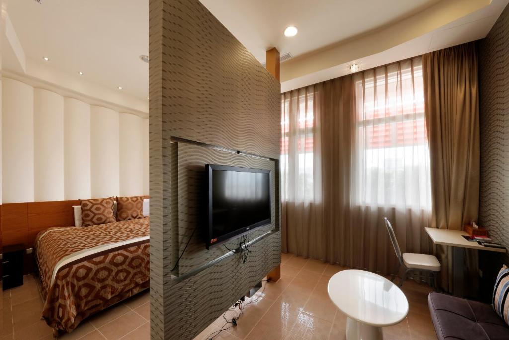 TV a/nebo společenská místnost v ubytování Zhi Da Craft Service Guest House