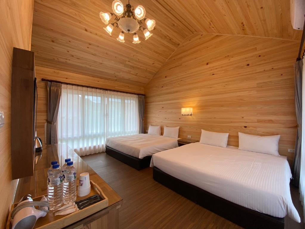 Postel nebo postele na pokoji v ubytování Puli Diary