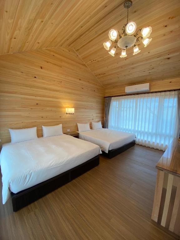 Postel nebo postele na pokoji v ubytování Puli Diary