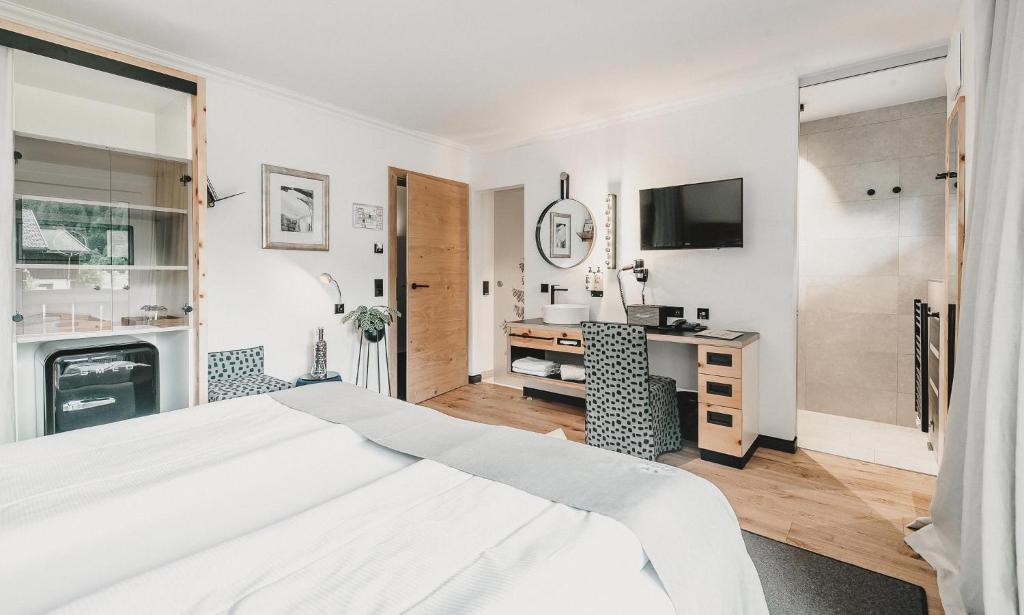 Kuchyň nebo kuchyňský kout v ubytování Hotel & Appartements Tiroler Buam