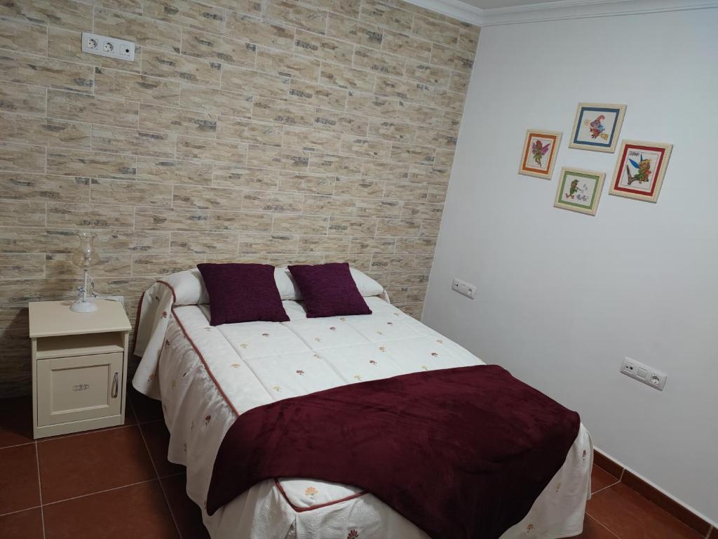 Postel nebo postele na pokoji v ubytování Villa Rosa