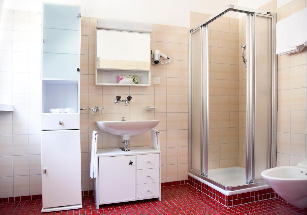 Koupelna v ubytování Albergo Lardi