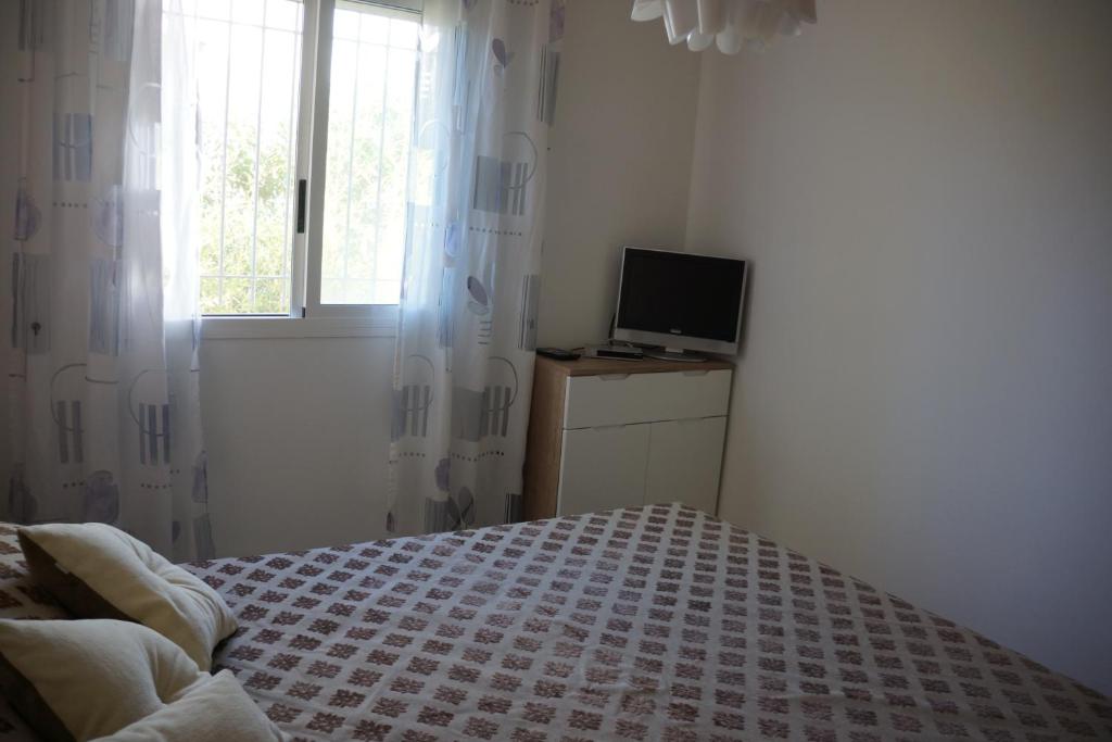 Postel nebo postele na pokoji v ubytování Laila