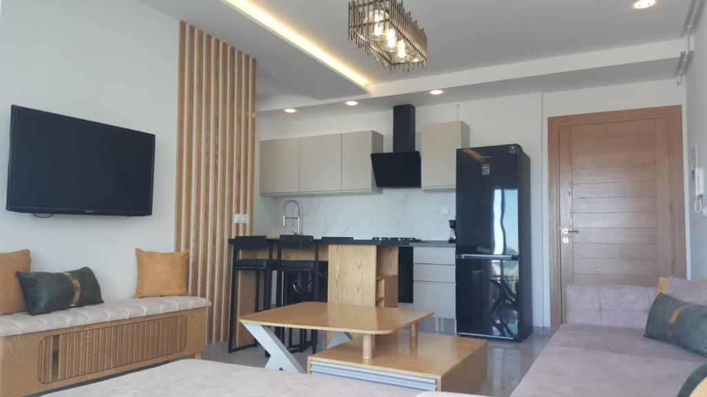 TV a/nebo společenská místnost v ubytování Horizon Appartment - Hammamet Nord