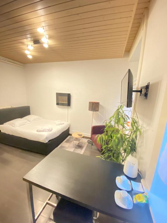 Postel nebo postele na pokoji v ubytování B&B Guest House Du Lac