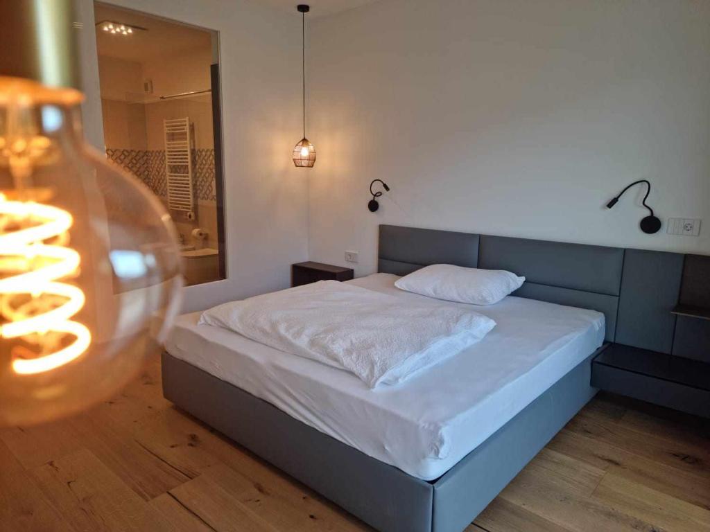 Postel nebo postele na pokoji v ubytování Pitla Cuna Eco Relais