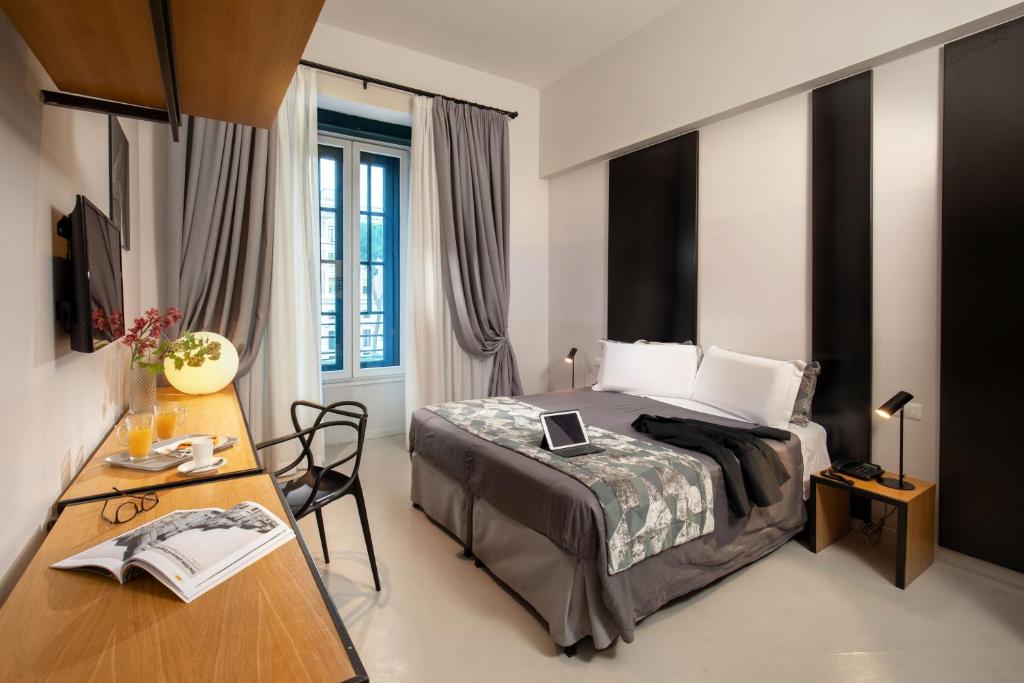 Katil atau katil-katil dalam bilik di Viminale View Hotel