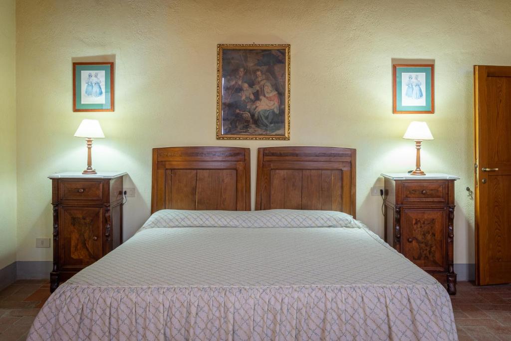 Postel nebo postele na pokoji v ubytování Agriturismo I Bonsi