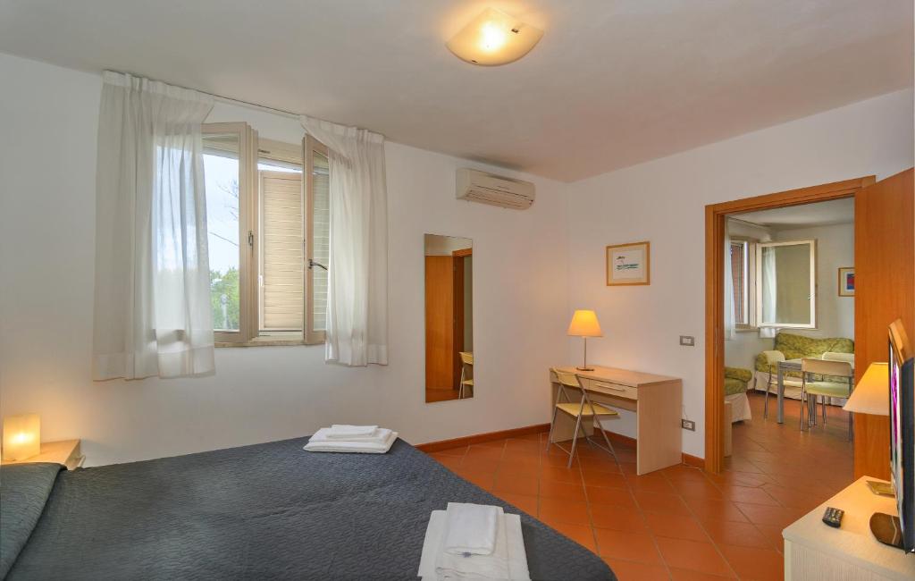 Cama o camas de una habitación en Residence San Rossore