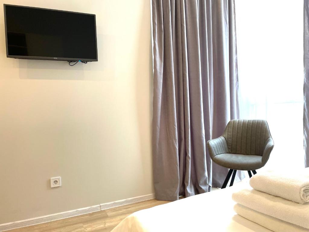 TV a/nebo společenská místnost v ubytování Mira Apart-Hotel