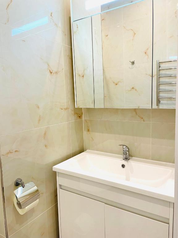 Koupelna v ubytování Mira Apart-Hotel