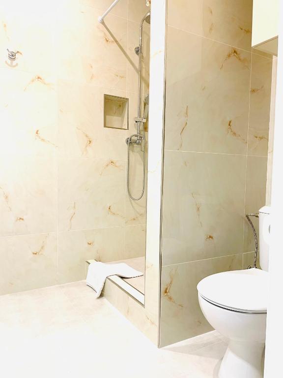 Koupelna v ubytování Mira Apart-Hotel