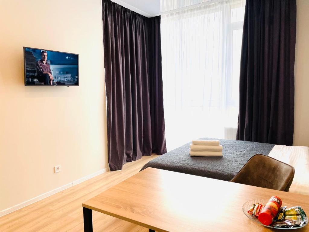 Postel nebo postele na pokoji v ubytování Mira Apart-Hotel