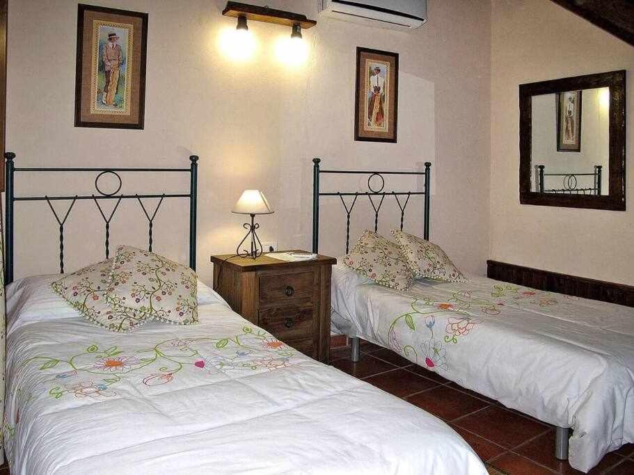 Postel nebo postele na pokoji v ubytování Finca Chona y Francisco