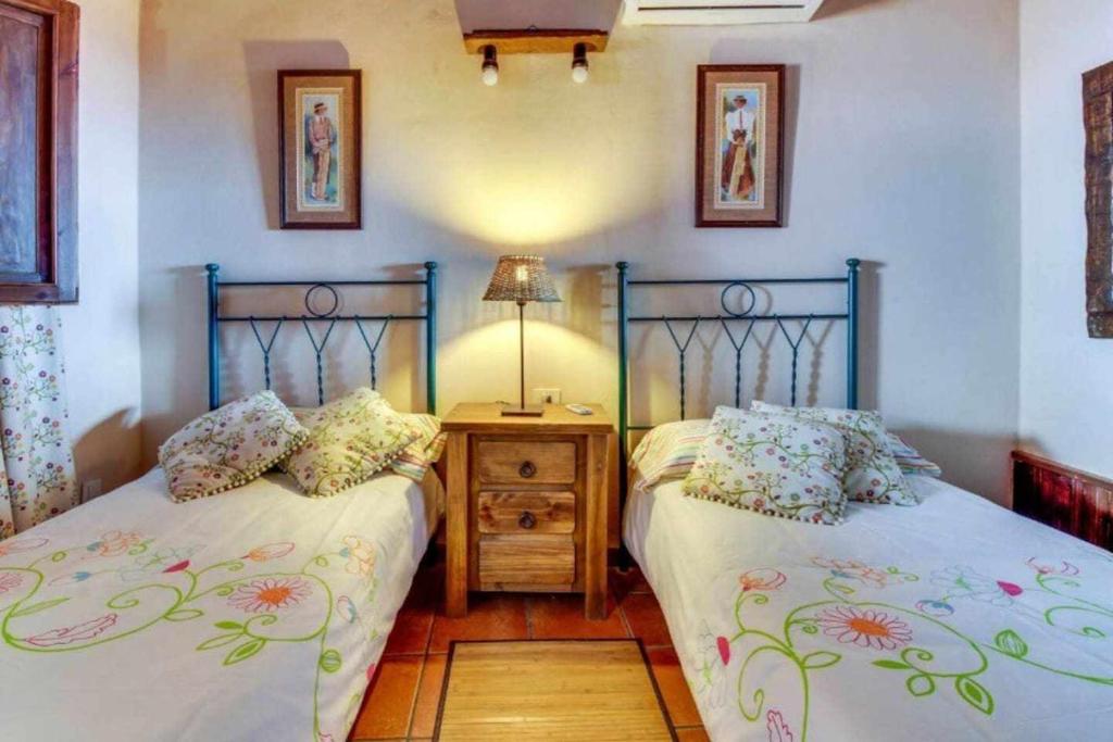 Postel nebo postele na pokoji v ubytování Finca Chona y Francisco