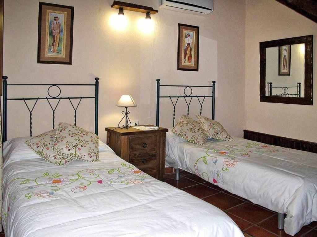 Postel nebo postele na pokoji v ubytování Finca Chona y Francisco